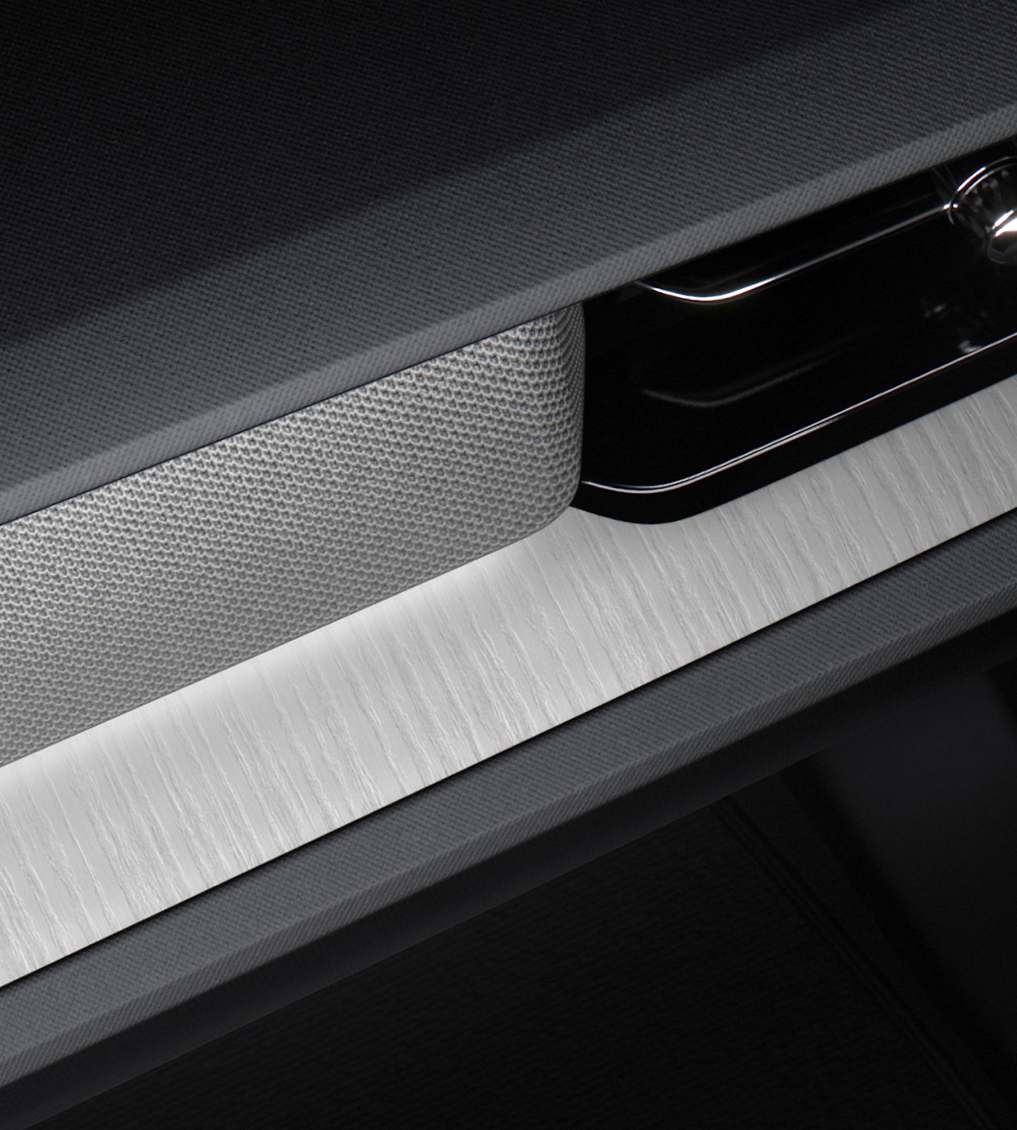 Polestar 2’s Light Ash deco illuminated with interior lighting.
