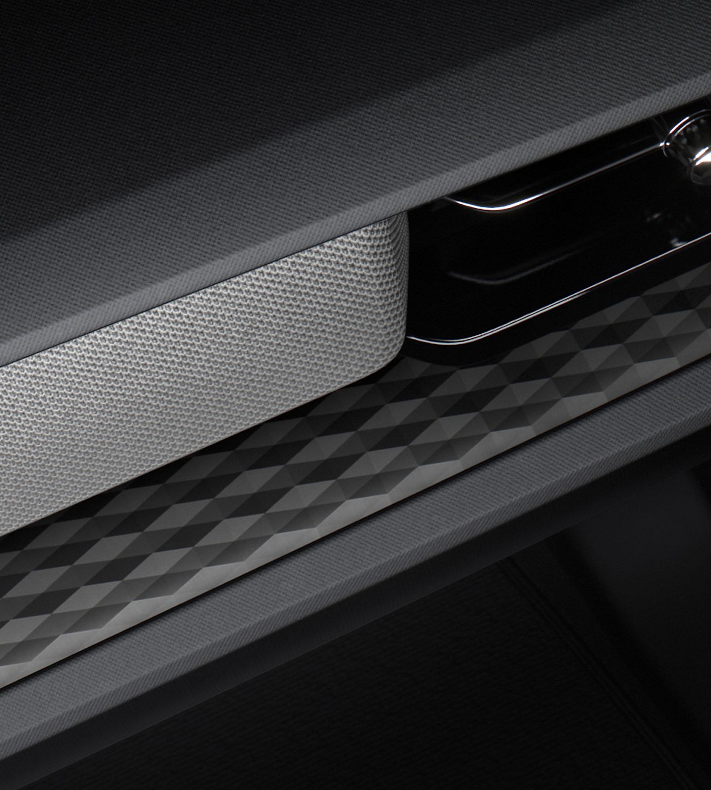 Polestar 2’s 3D etched deco illuminated with interior lighting.