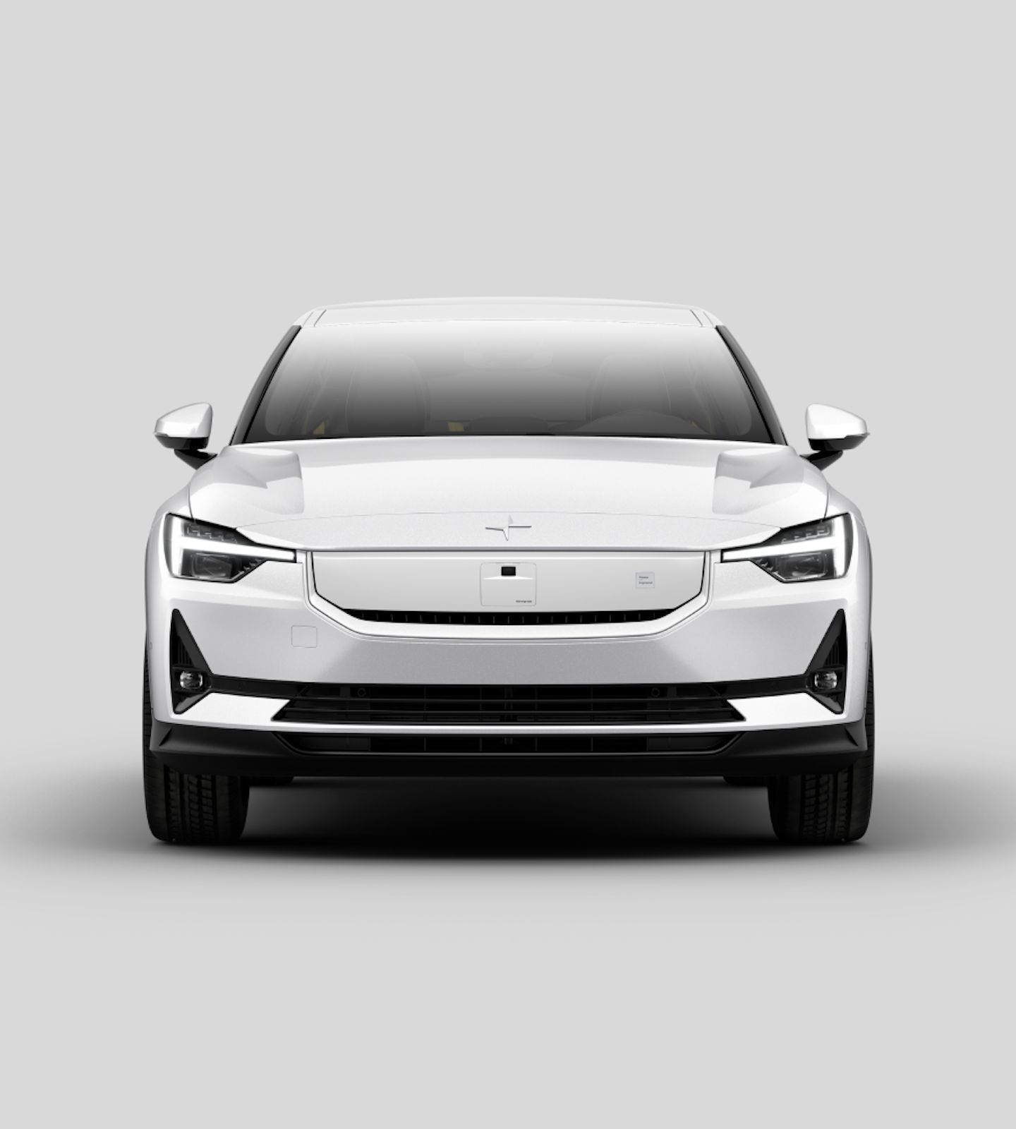 Front view of Polestar 2 in Snow colour standing against a white background.