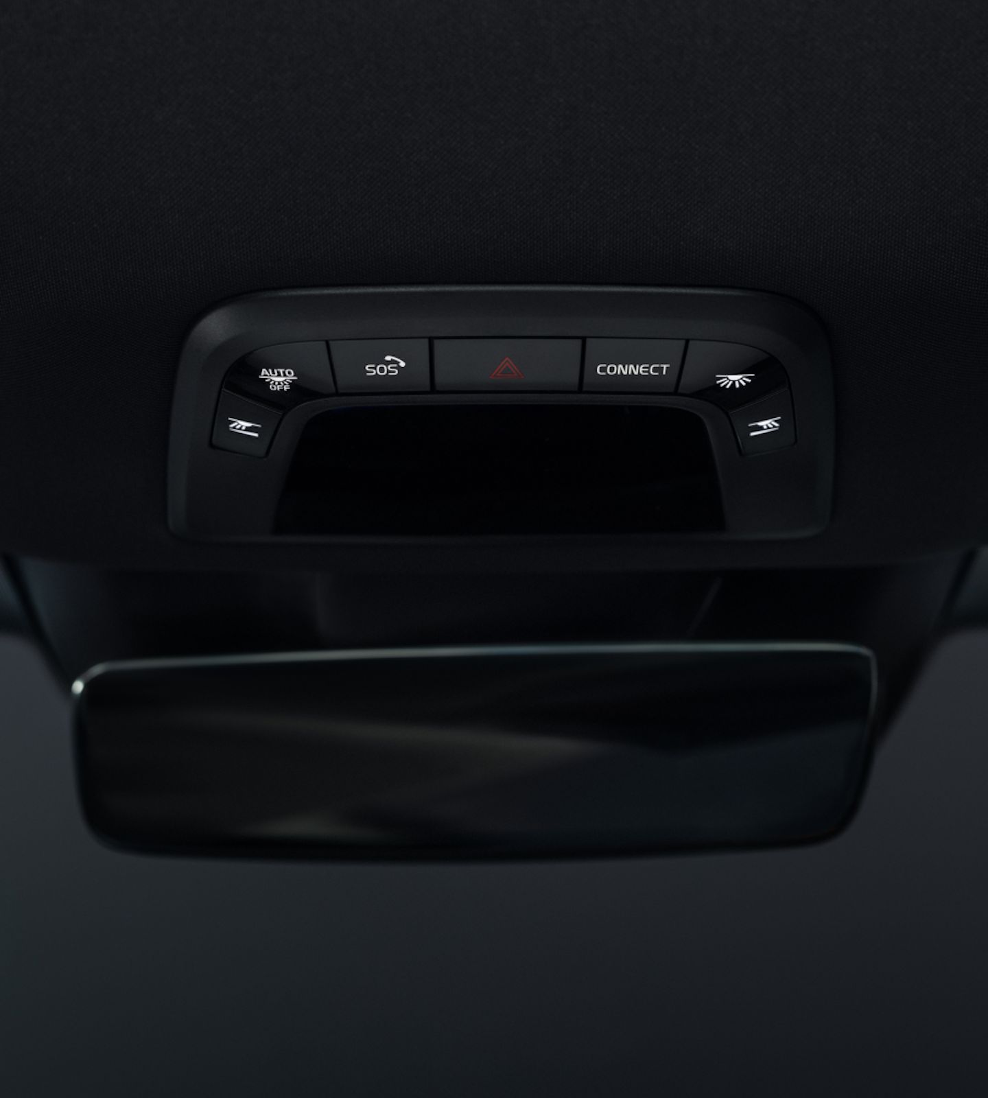 Polestar 3’s overhead console with illuminated buttons in a dark background.