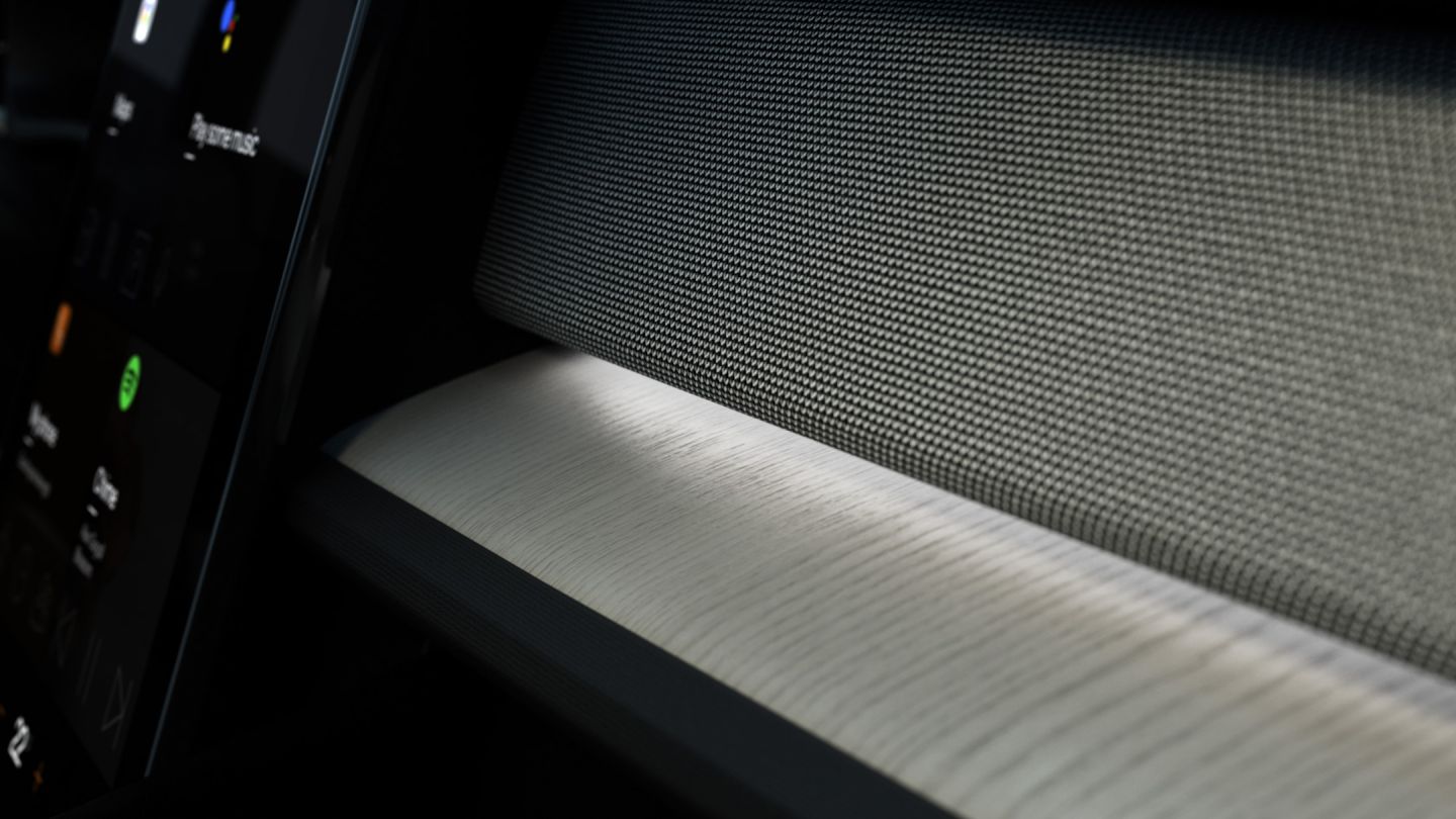 White interior lighting illuminating Polestar 2’s dashboard and centre console areas.