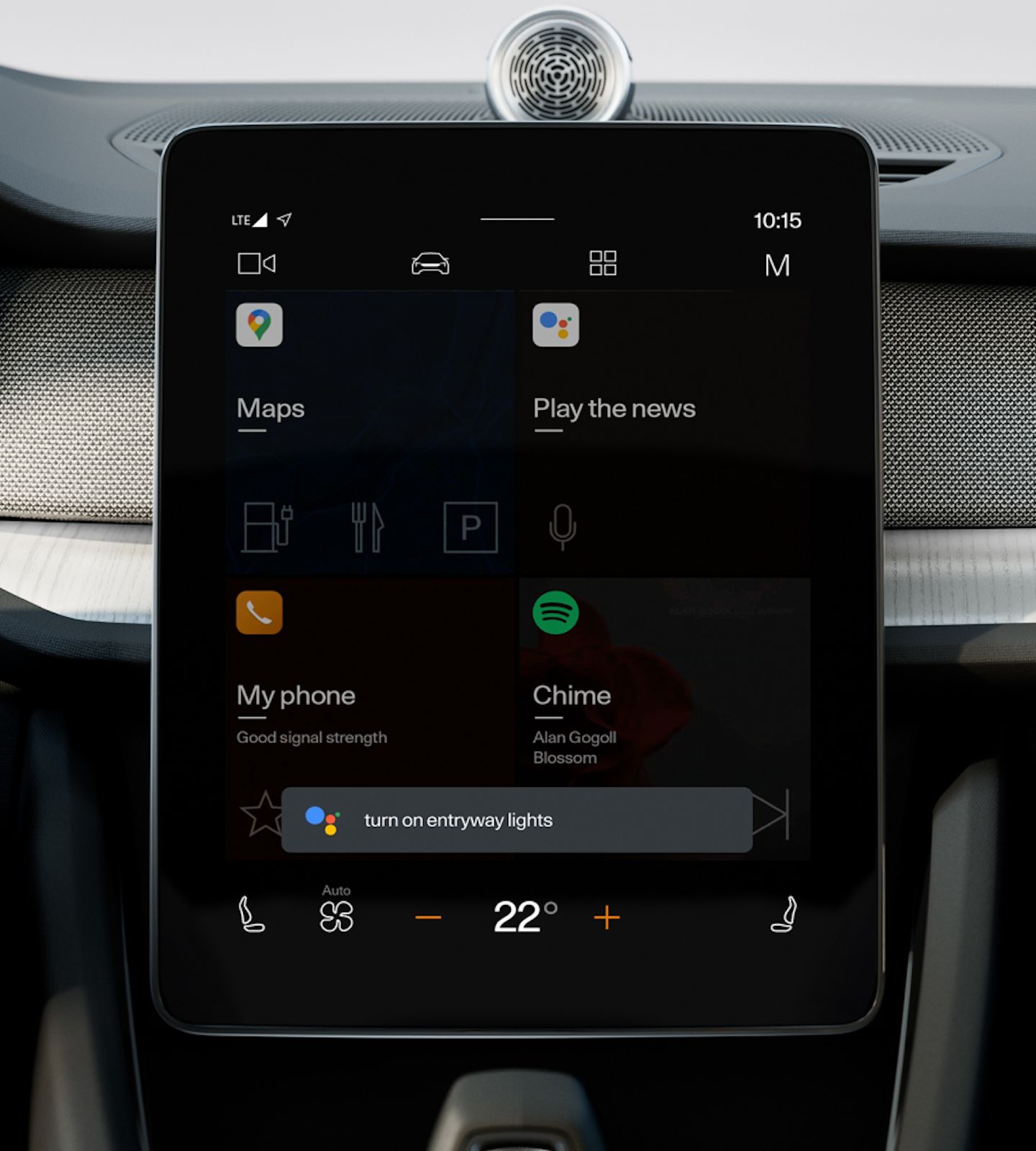 Polestar 2’s centre display showing the home screen with a Google Home voice prompt.
