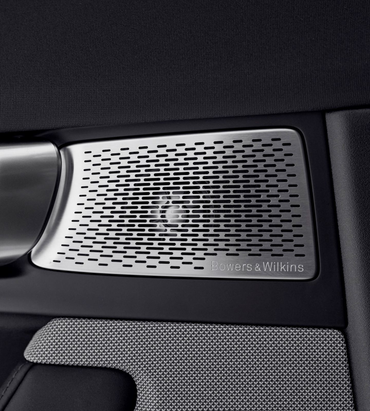 A close up of the midrange and door speakers for  Bowers & Wilkins audio system for Polestar 2.