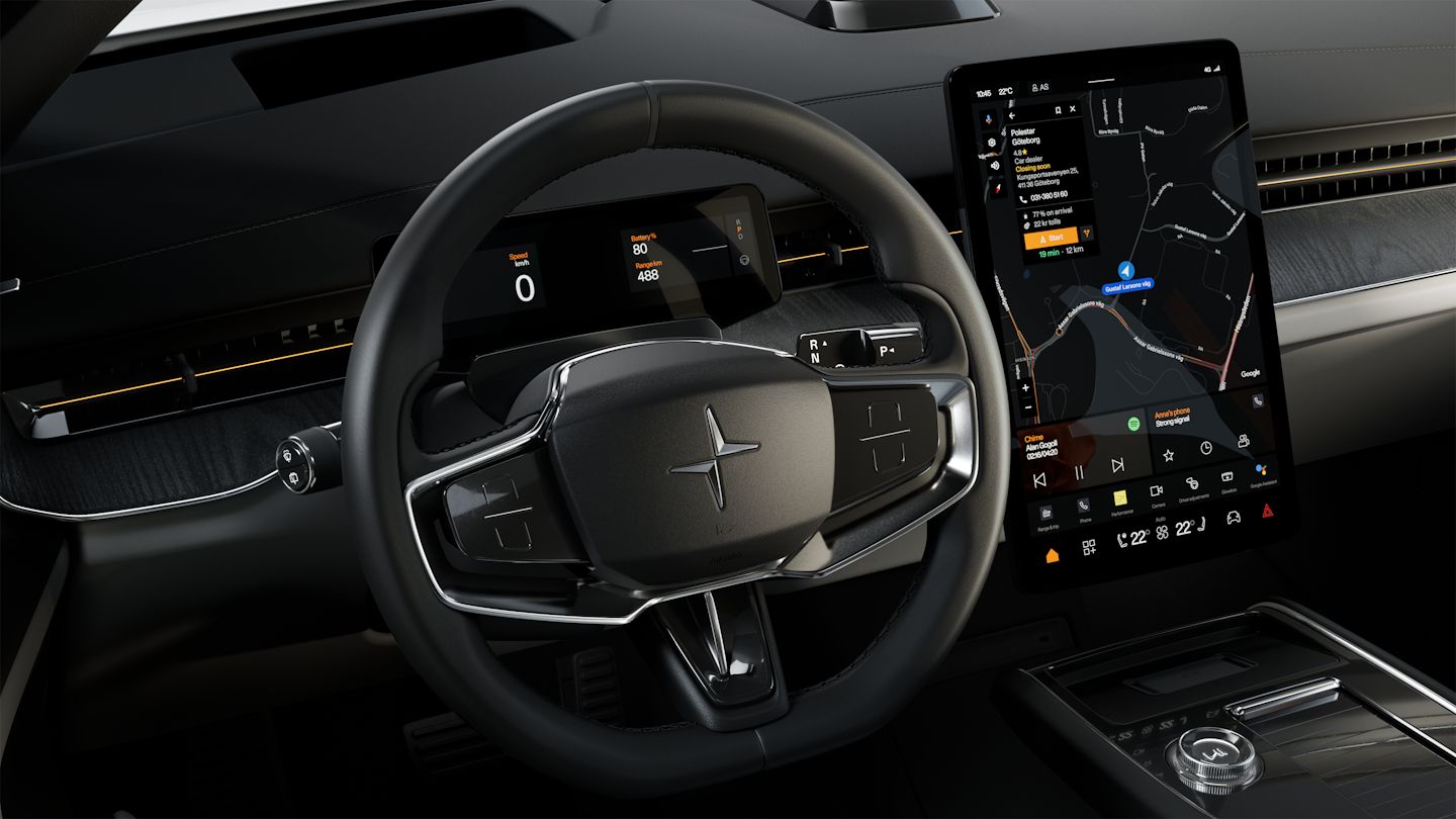 Polestar 3’s steering wheel, dashboard, and centre display showing the Google Play Store screen.